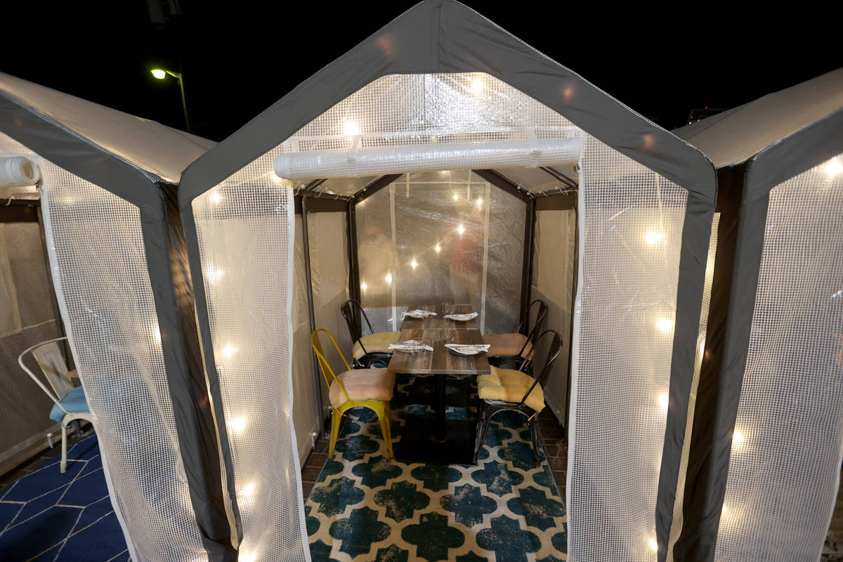 Outdoor individual dining tents at Esther's Kitchen in downtown Las Vegas restaurant Monday, De ...