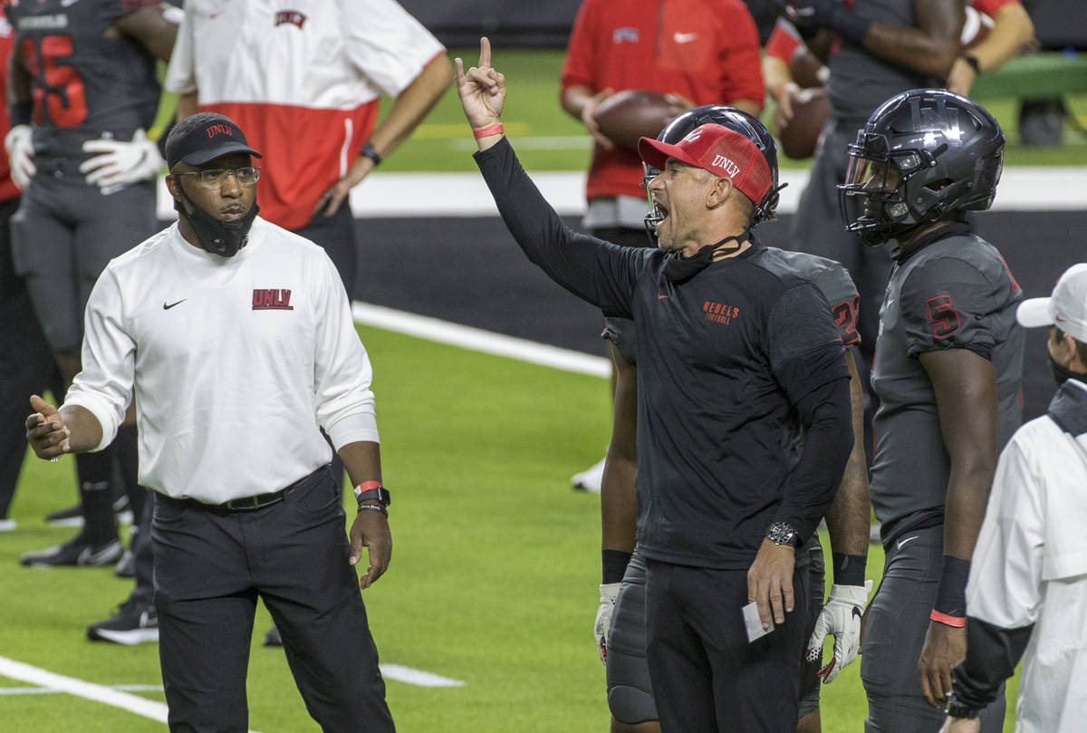 UNLV Rebels head coach Marcus Arroyo yells to his players before the first half of their NCAA f ...