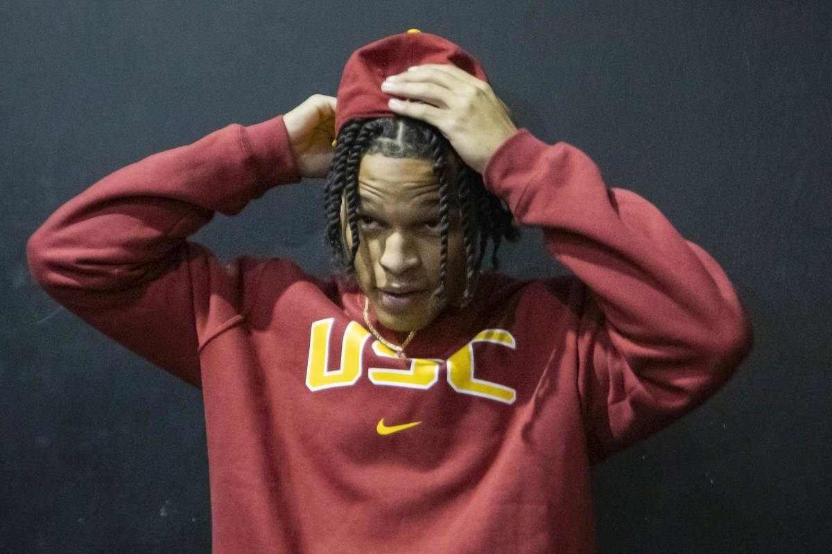 Desert Pine wide receiver Michael Jackson is seen wearing a University of Southern California s ...