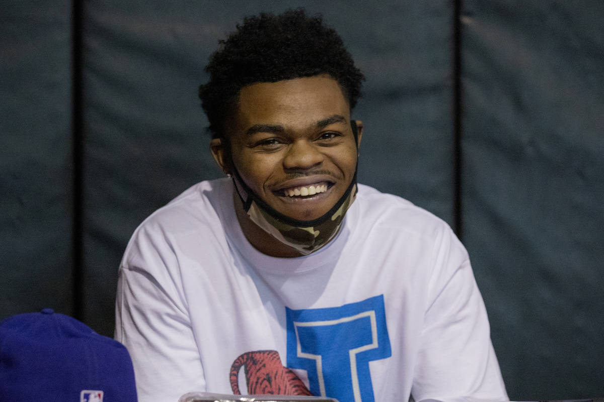 Desert Pines high school defensive end Braezhon Ross, singing with Jackson State University, is ...