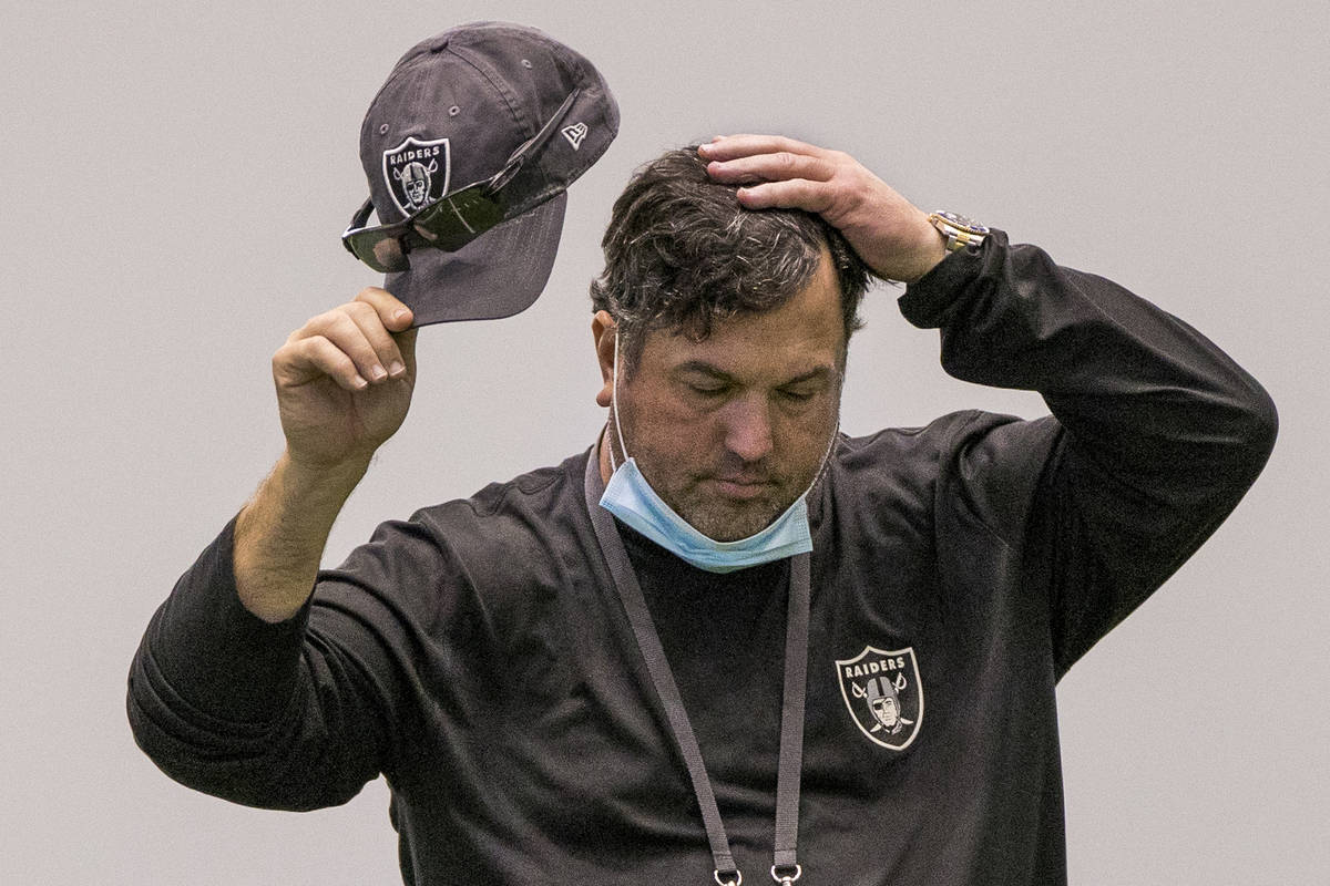 Las Vegas Raiders defensive coordinator Paul Guenther takes a moment to consider things during ...