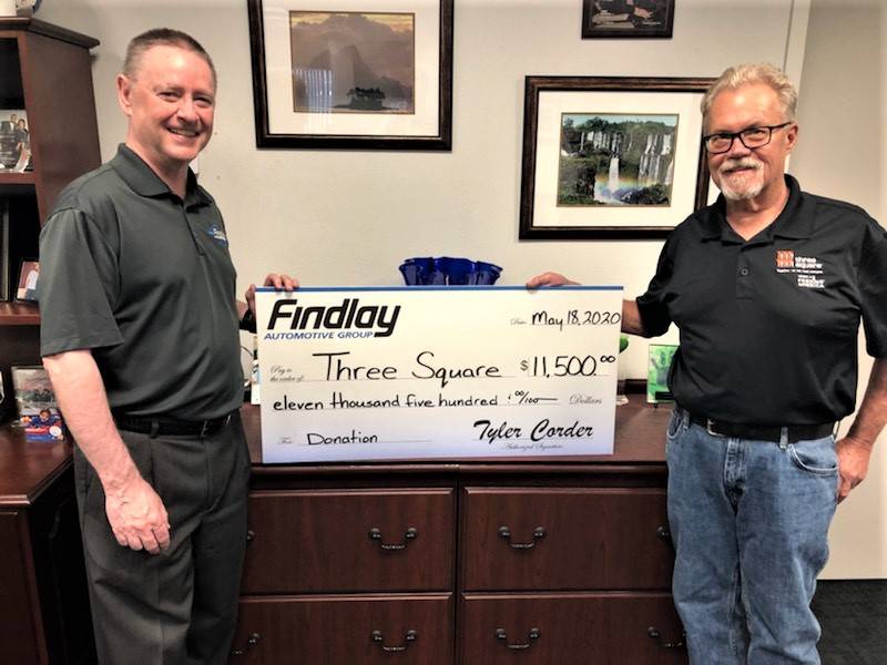 Tyler Corder, Findlay Automotive CFO, and Dan Johnson, Three Square senior development officer, ...