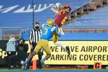 Southern California wide receiver Amon-Ra St. Brown (8) catches a pass in the end zone for a to ...