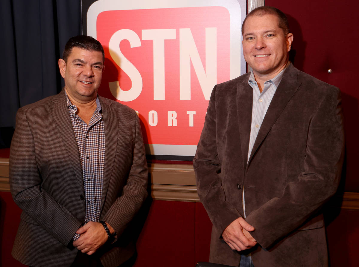 Red Rock Resort sportsbook director Jason McCormick, left, and Sunset Station sportsbook direct ...