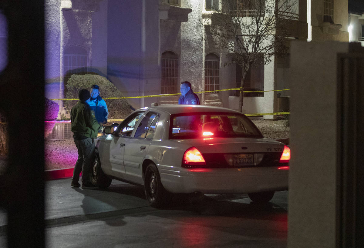 Police investigate a homicide Wednesday, Dec. 16, 2020, at Pacific Legends Apartments, 1405 S. ...