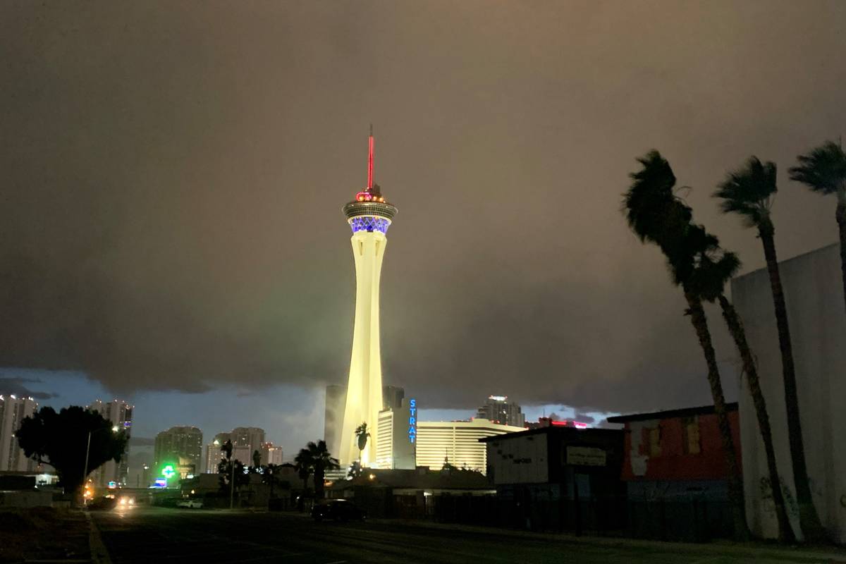 A winter storm moves over the Stratosphere on the Las Vegas Strip on Thursday, Dec. 17, 2020. ( ...