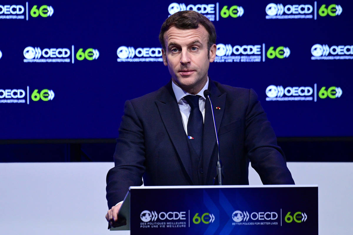 FILE - In this Dec.14, 2020 file photo, French President Emmanuel Macron speaks during a ceremo ...