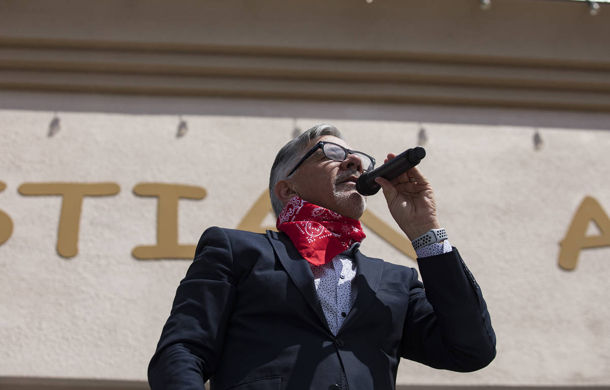 Pastor Paul Marc Goulet leads an Easter service in the parking lot at International Church of L ...