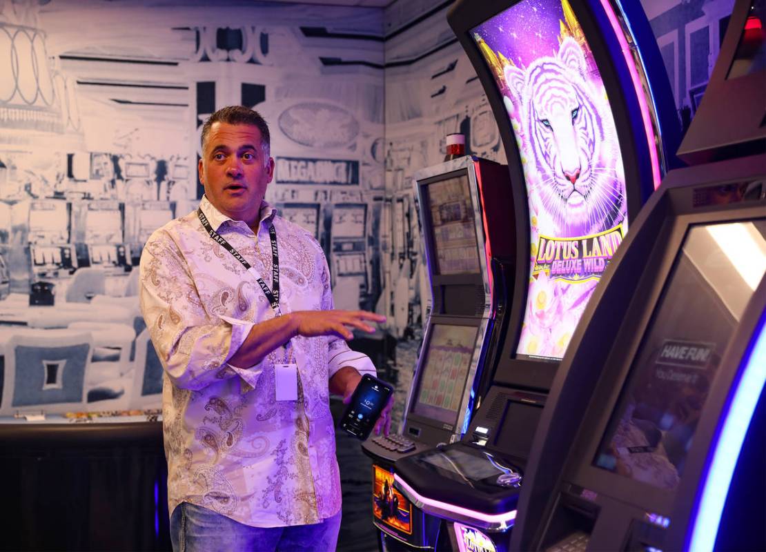 Christopher Justice, president of Global Payments Gaming Solutions, speaks to the Review-Journa ...