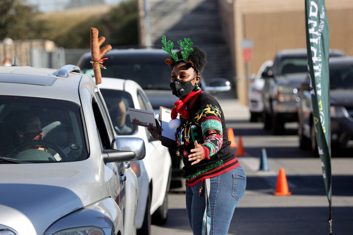 Vice Principal Frances Lucero directs traffic at Martinez Elementary School in North Las Vegas ...