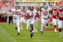 Alabama punt returner DeVonta Smith (6) returns a punt for a touchdown against Arkansas during ...