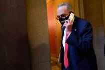 Senate Minority Leader Sen. Chuck Schumer of N.Y., walks on Capitol Hill in Washington, Tuesday ...