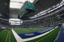 Fans watch as the Atlanta Falcons play the Dallas Cowboys at AT&T Stadium in the first half ...