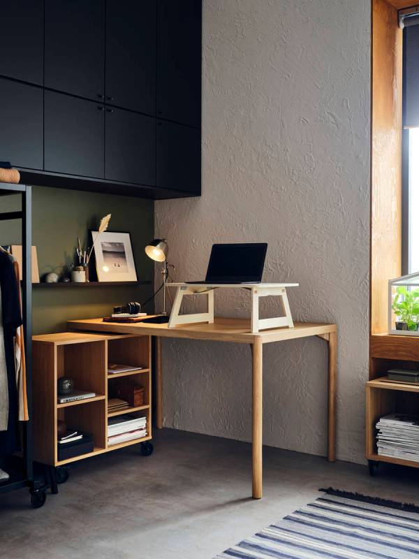 Eat at your desk or work at the table. There's room for both at the Ravaror wooden dining table ...