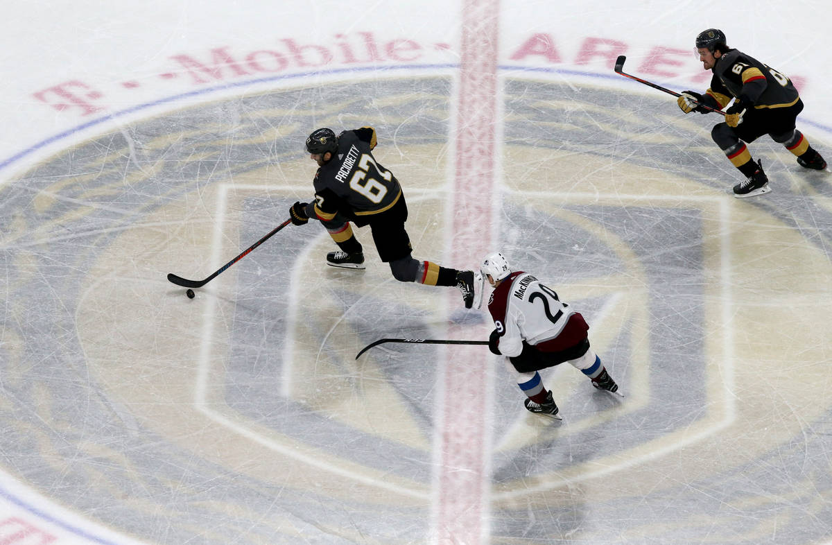 Vegas Golden Knights left wing Max Pacioretty (67) moves the puck in front of Colorado Avalanch ...