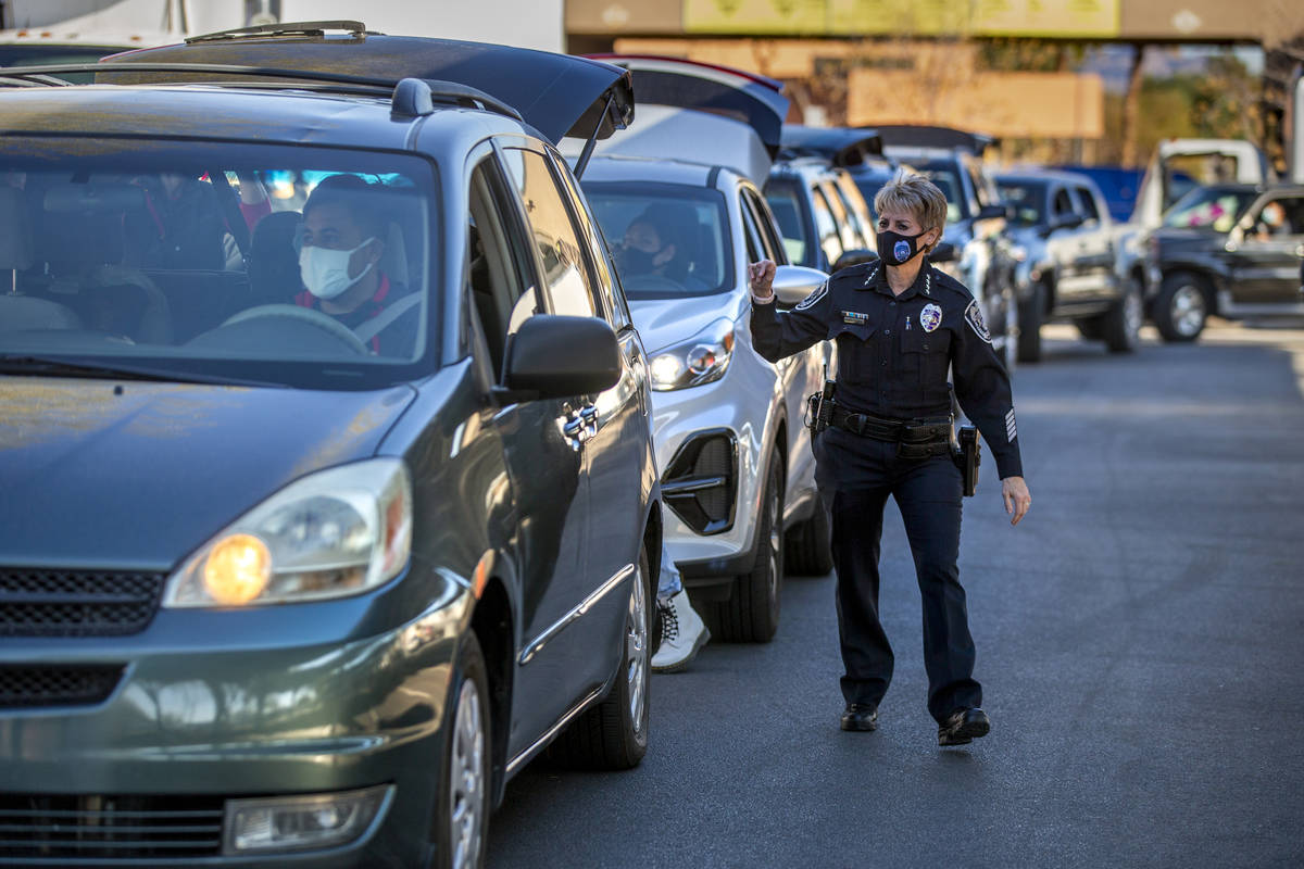 North Las Vegas Police Department Chief Pamela Ojeda directs traffic during the first NLVPD Hol ...