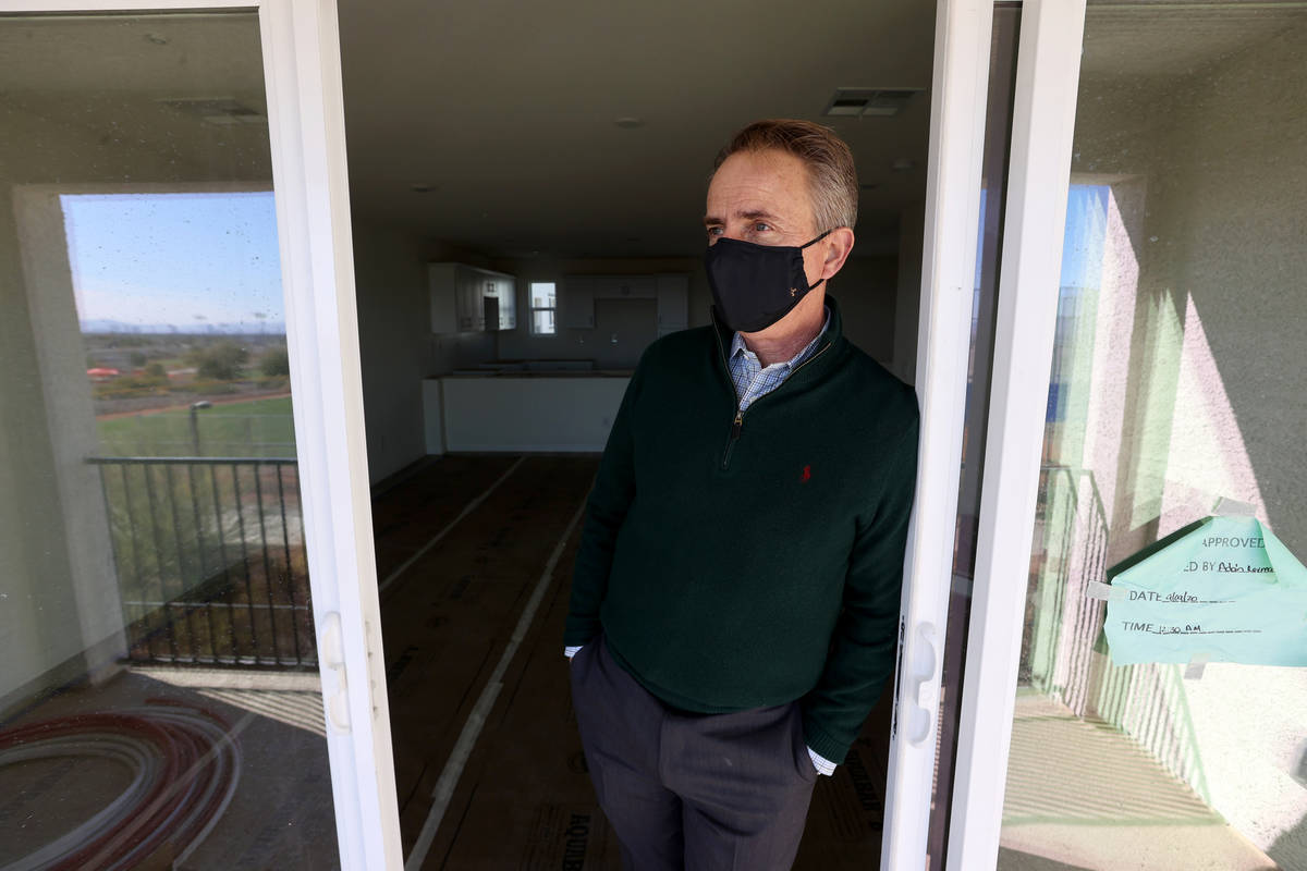 Tom McCormick, founder, Touchstone Living looks at the view of the Strip at his Panorama housin ...