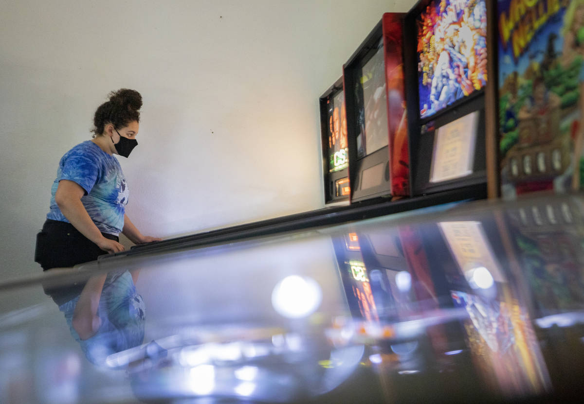 Sayler Eastin, 17, of Columbia, Mo., plays games at the Pinball Hall of Fame, during the launch ...