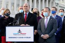 Problem Solvers Caucus co-chairs Rep. Tom Reed, R-N.Y., at podium, and Rep. Josh Gottheimer, D- ...