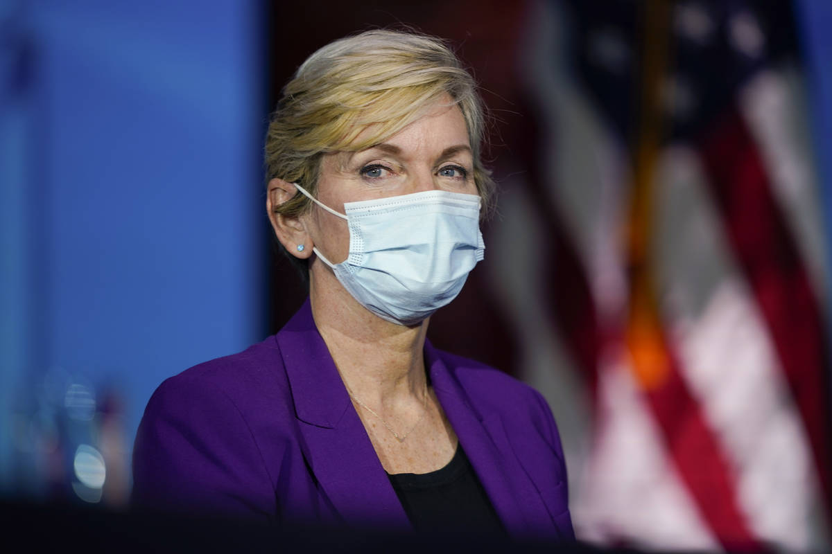 Former Michigan Gov. Jennifer Granholm, listens as President-elect Joe Biden announces her as h ...