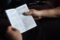 BJ Soper looks at a copy of the U.S. Constitution. (Matt McClain/The Washington Post)