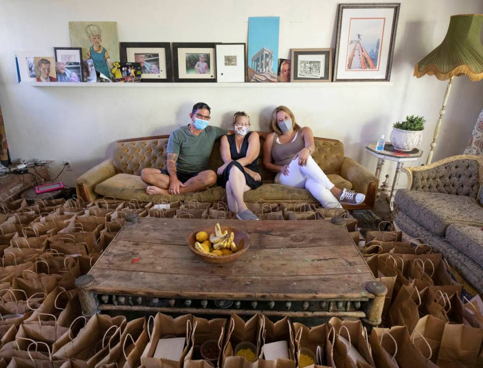 Chef Luke Palladino, from left, with Kim Foster, organizer of the Please Send Noodles cookbook ...