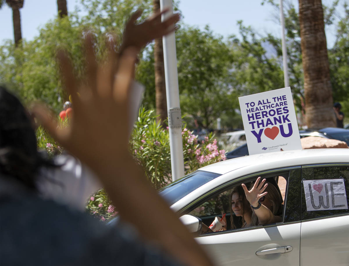 Vehicles drive through to thank Southwest Medical physicians and nurses in April. (Ellen Schmid ...