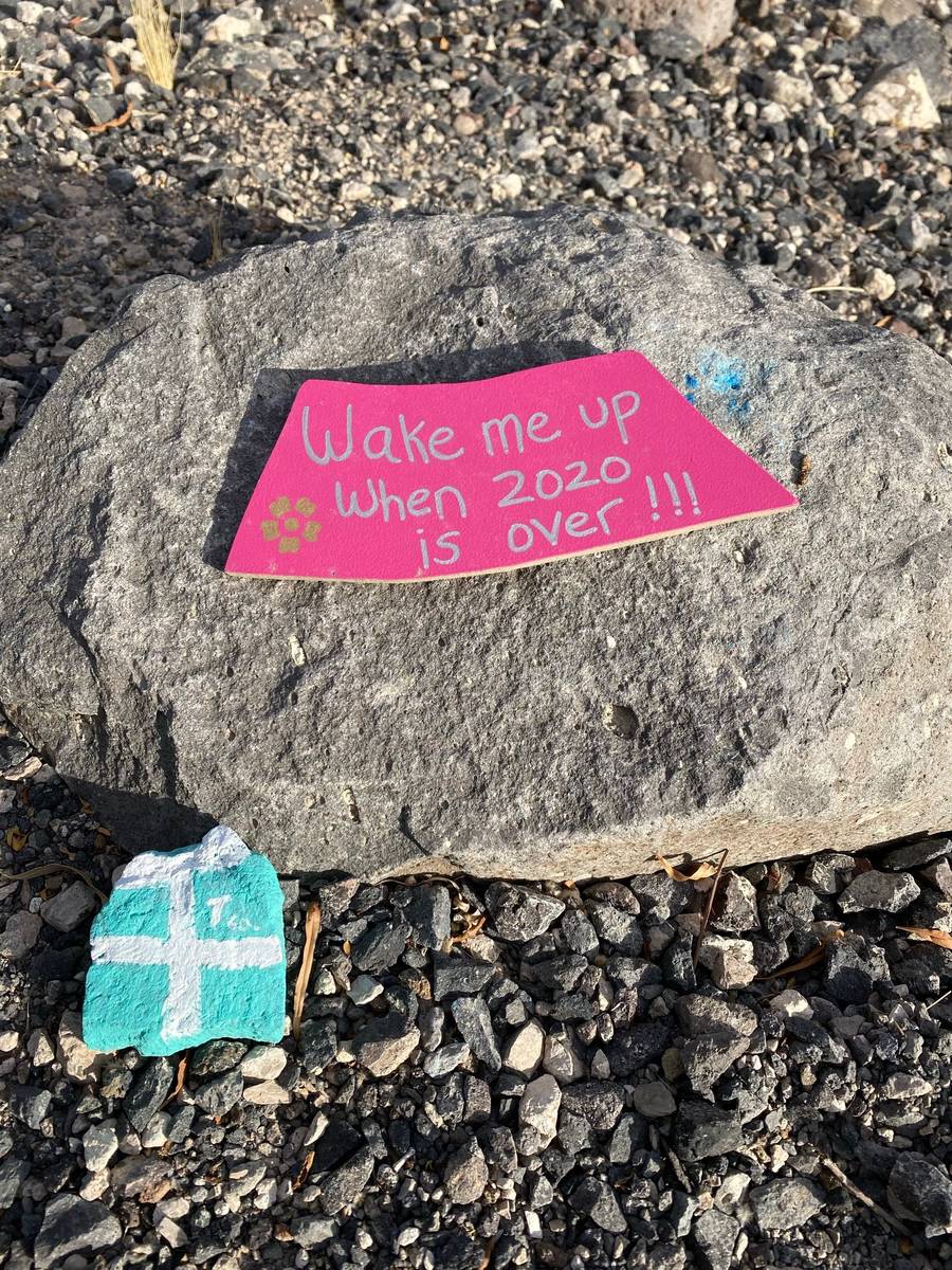 Painted rocks to cheer passersby began popping up along the Nevada Power Trail in Henderson dur ...