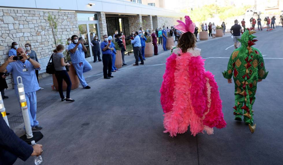 Jade Simone and Piff the Magic Dragon arrive for a show at Sunrise Hospital and Medical Center ...