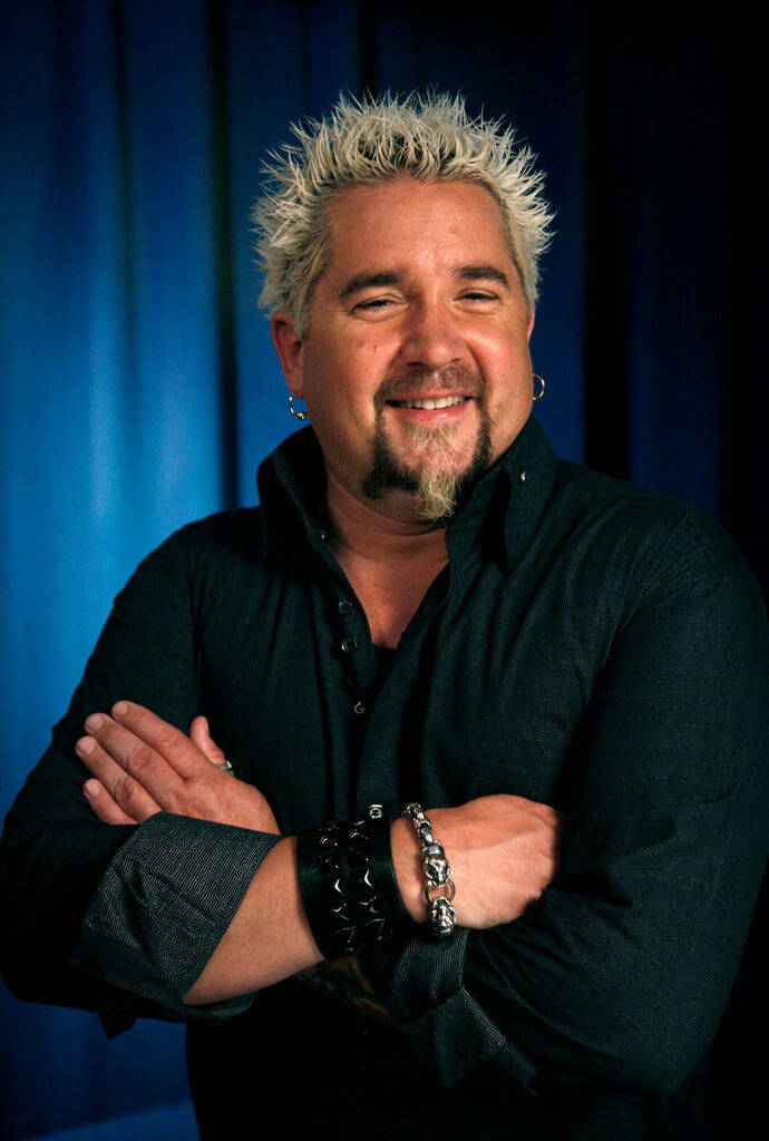 Guy Fieri helped raise $21.5 million for the Restaurant Employee Relief Fund. (The Associated P ...