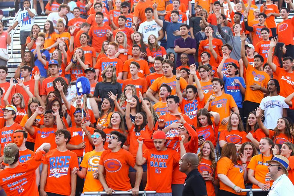 Bishop Gorman students cheer before the start of a football game against Orem at Bishop Gorman ...