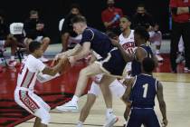UNLV Rebels guard Nicquel "Nick" Blake (22 left) and Montana State Bobcats forward Fi ...