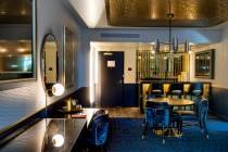 A comfortable living and retro bar area within the Circa End Suite at Circa on Friday, Dec. 18, ...