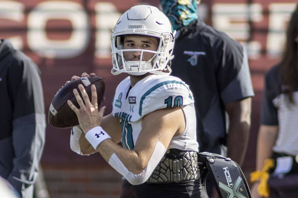 Coastal Carolina quarterback Grayson McCall (10) warms up before an NCAA college football game ...