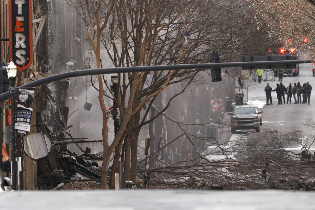 Emergency personnel work at the scene of an explosion in downtown Nashville, Tenn., Friday, Dec ...