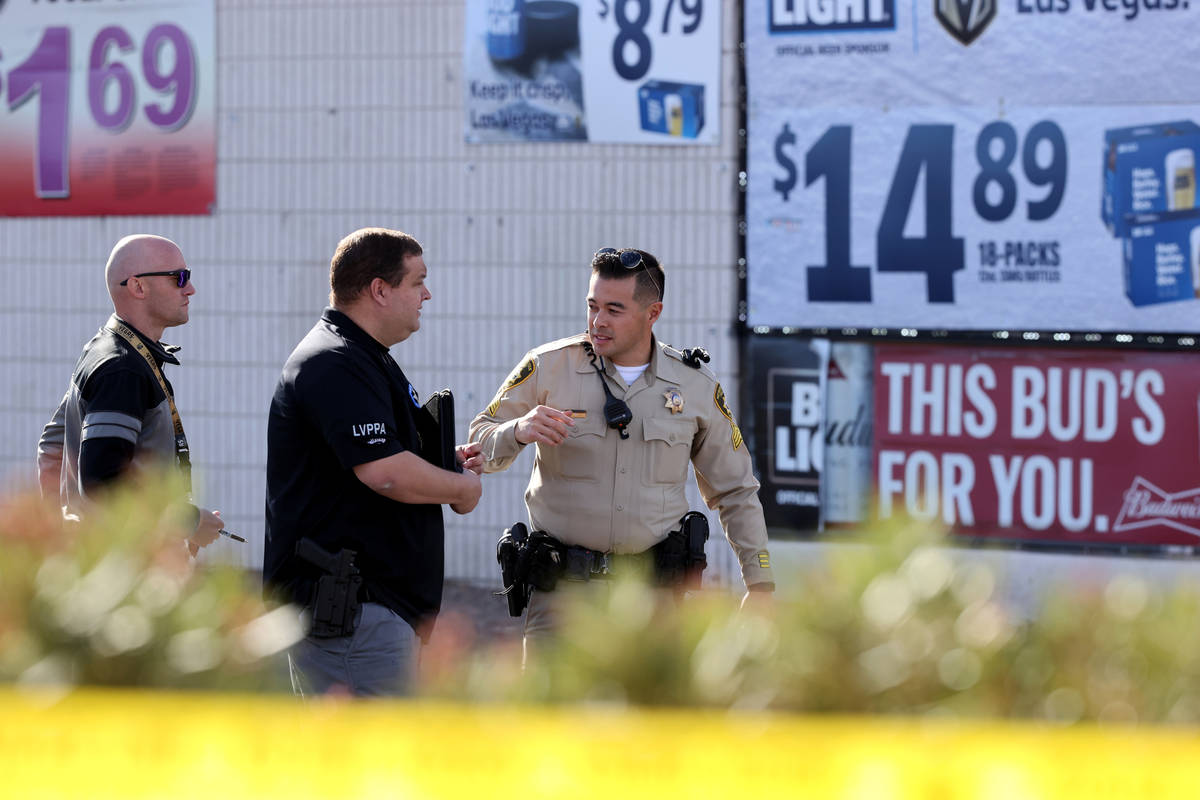 Las Vegas police investigate at the scene of a shooting on East Sahara Avenue near Paradise Roa ...