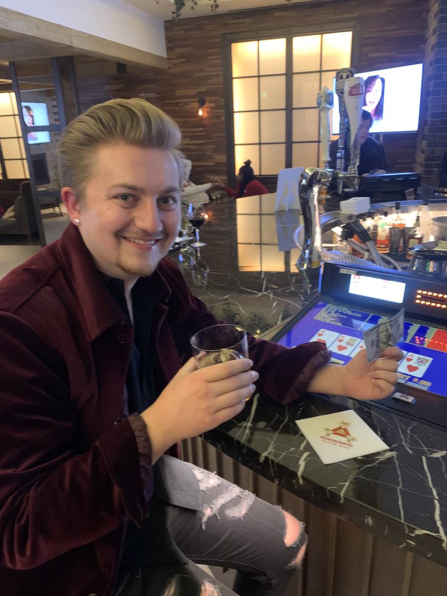 Cole Davis Duffy enjoys his first cocktail after turning 21, a Sean McBurney Manhattan, just af ...