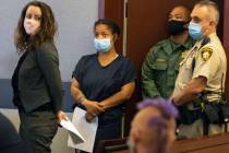 Amanda Sharp-Jefferson, second left, charged with murder in connection with the death of her 1- ...
