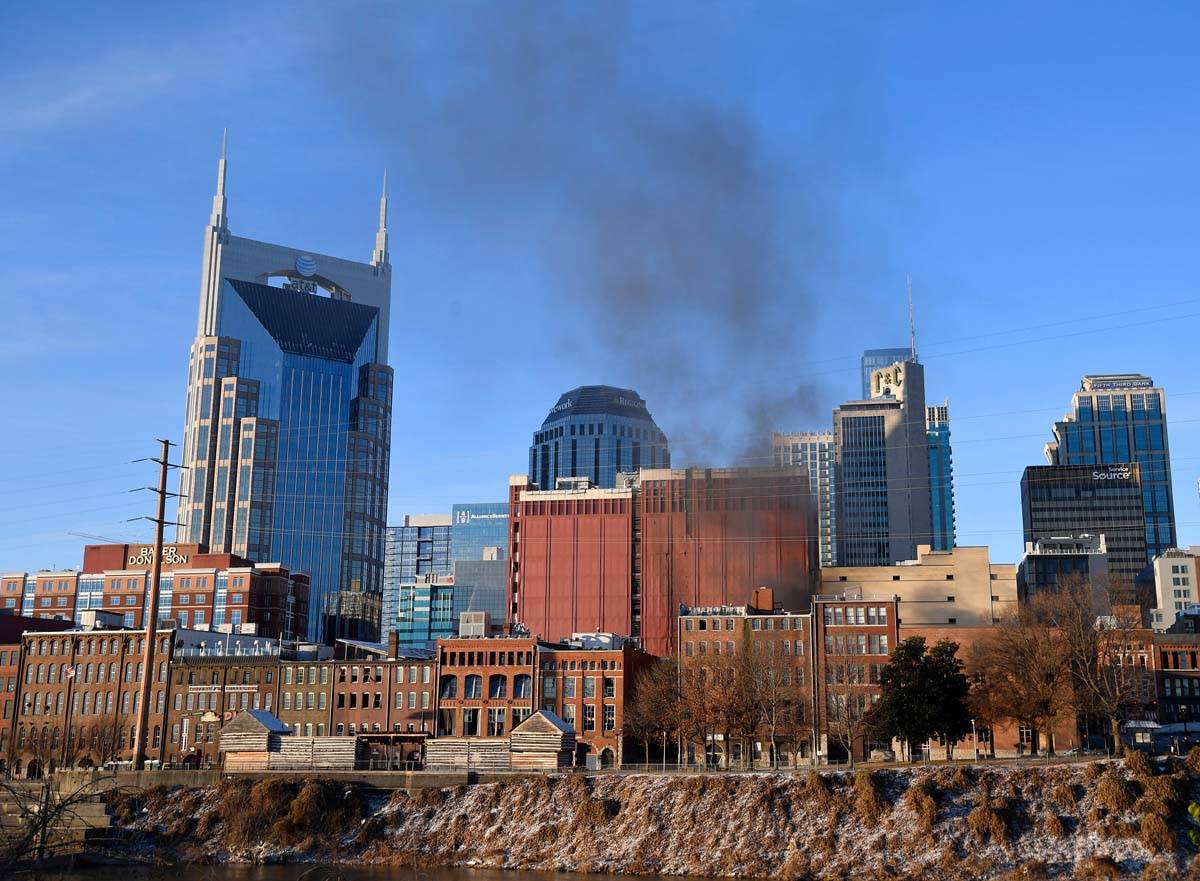 Smoke rises from downtown after a reported explosion on Friday, Dec. 25, 2020 in Nashville, Ten ...