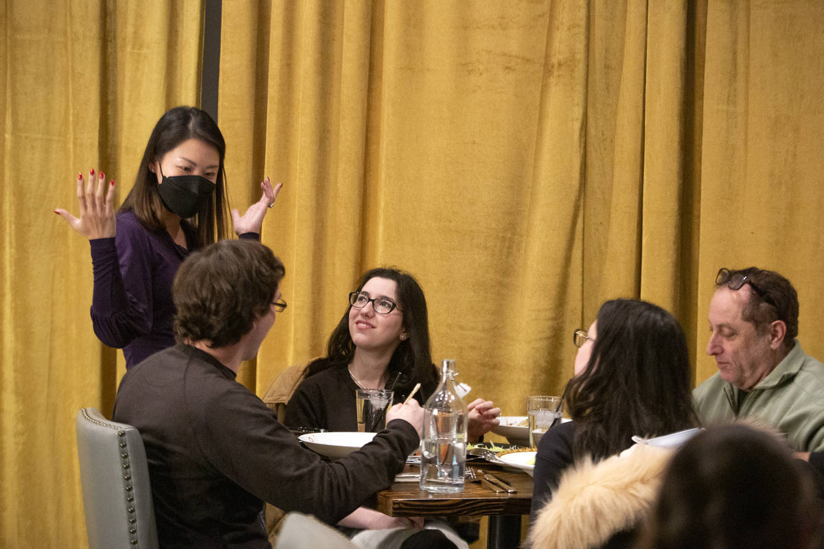 Brianna Winner, center, and her family chat with Chinglish Cantonese Wine Bar co-owner Kitty He ...