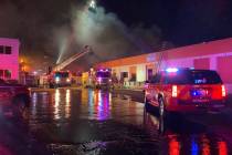 Crews battle a fire on the 1800 block of Industrial Avenue in Las Vegas, Wednesday, Dec. 30, 20 ...