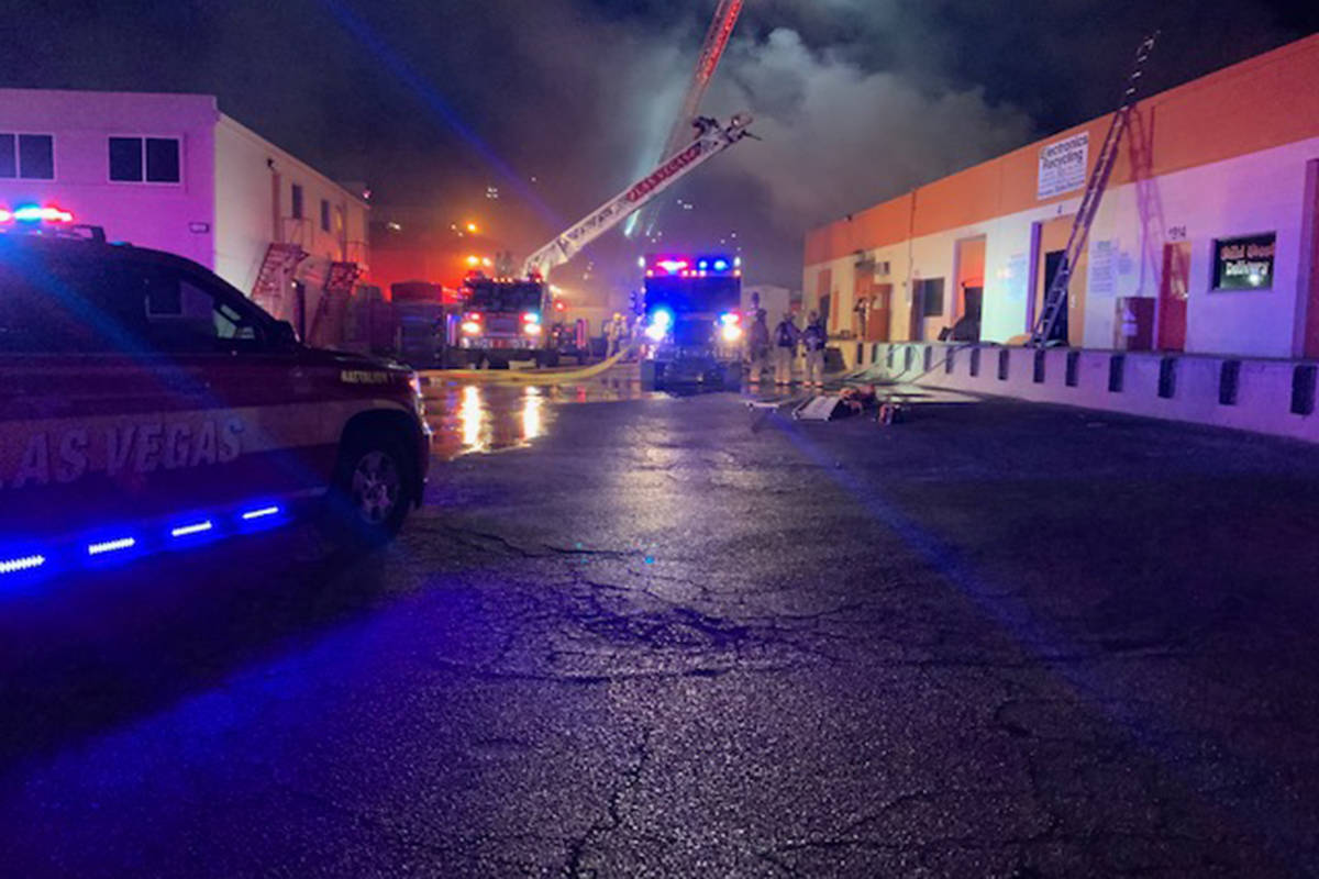 Crews battle a fire on the 1800 block of Industrial Avenue in Las Vegas, Wednesday, Dec. 30, 20 ...