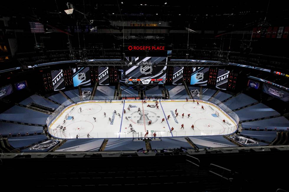 Edmonton Oilers and the Calgary Flames players warm up prior to an exhibition NHL hockey game T ...