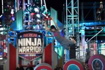 Mathis "Kid" Owhadi runs the "American Ninja Warrior" course in Las Vegas. (David Becker/NBC)