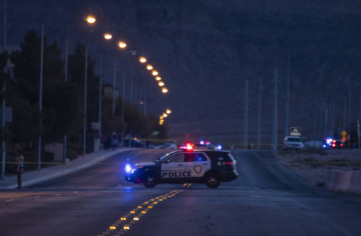Police investigate a two-vehicle crash Wednesday, Dec. 30, 2020, at South Fort Apache Road and ...