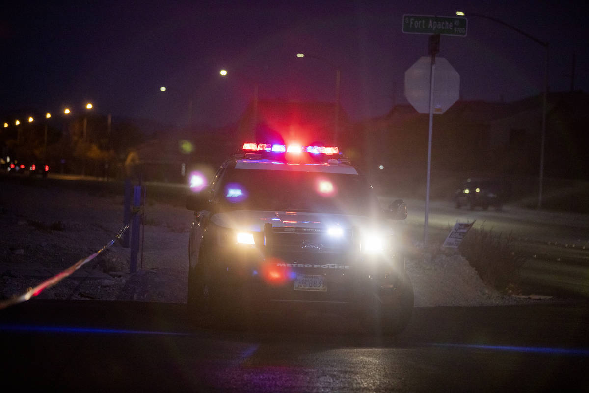 Police investigate a two-vehicle crash Wednesday, Dec. 30, 2020, at South Fort Apache Road and ...