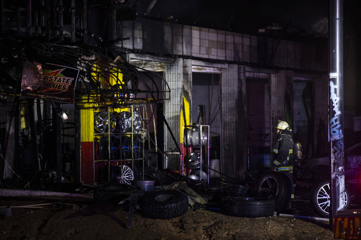 Las Vegas firefighters respond to a fire at a tire shop off Decatur Boulevard at Meadows Lane i ...