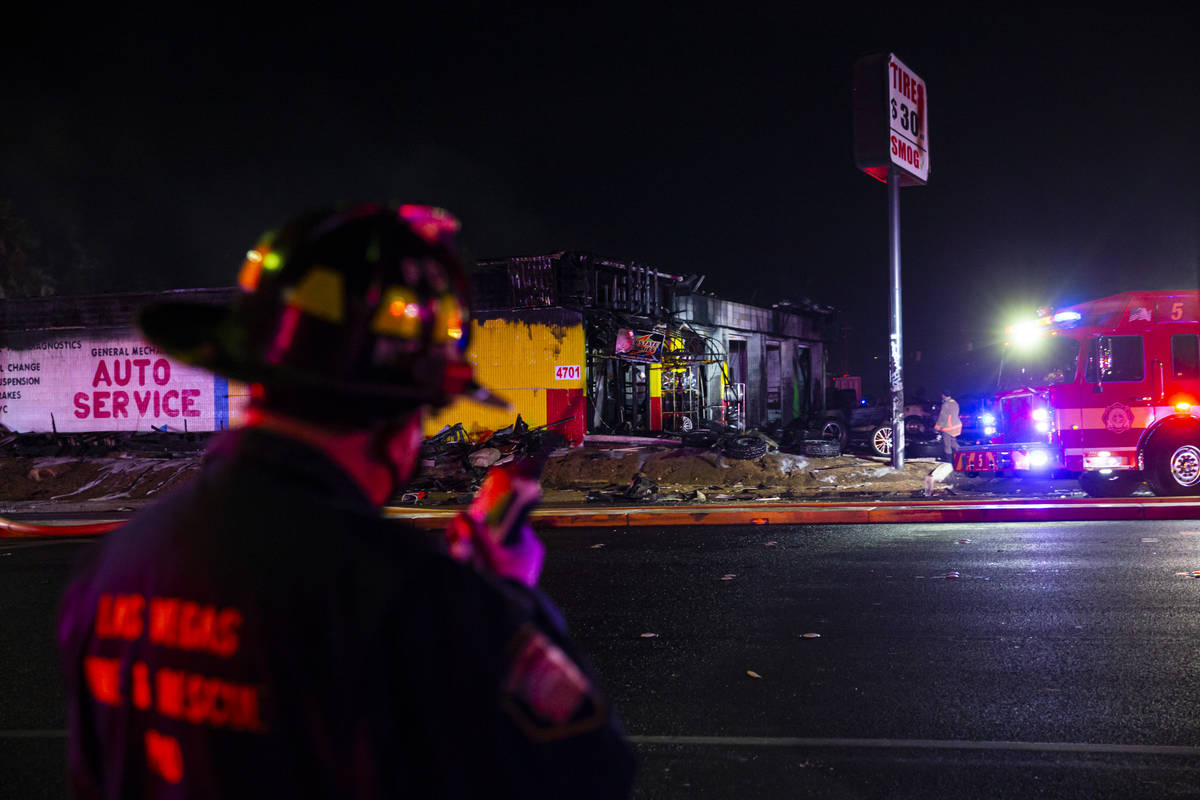 Las Vegas firefighters respond to a fire at a tire shop off Decatur Boulevard at Meadows Lane i ...