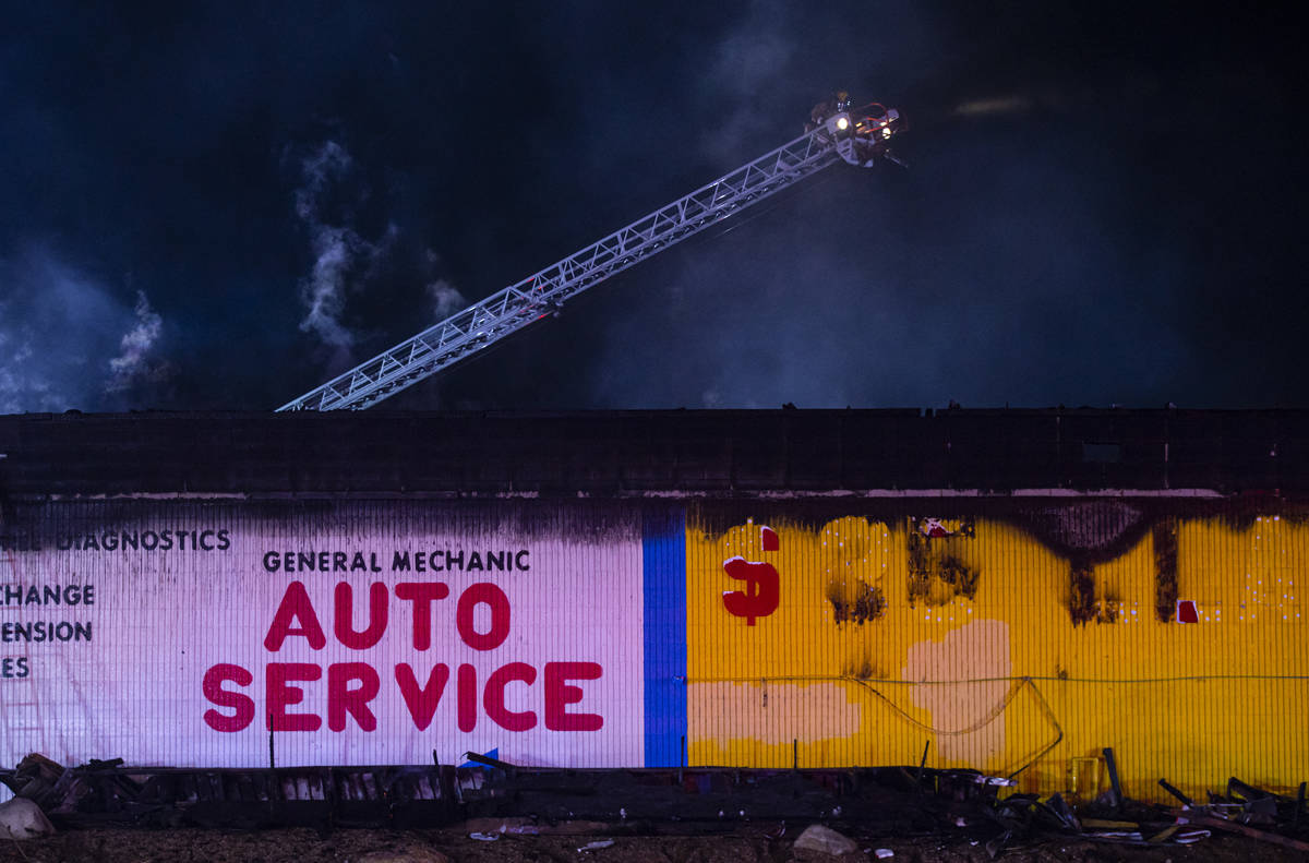 Las Vegas firefighters respond to a fire at a tire shop off Decatur Boulevard at Meadows Lane i ...