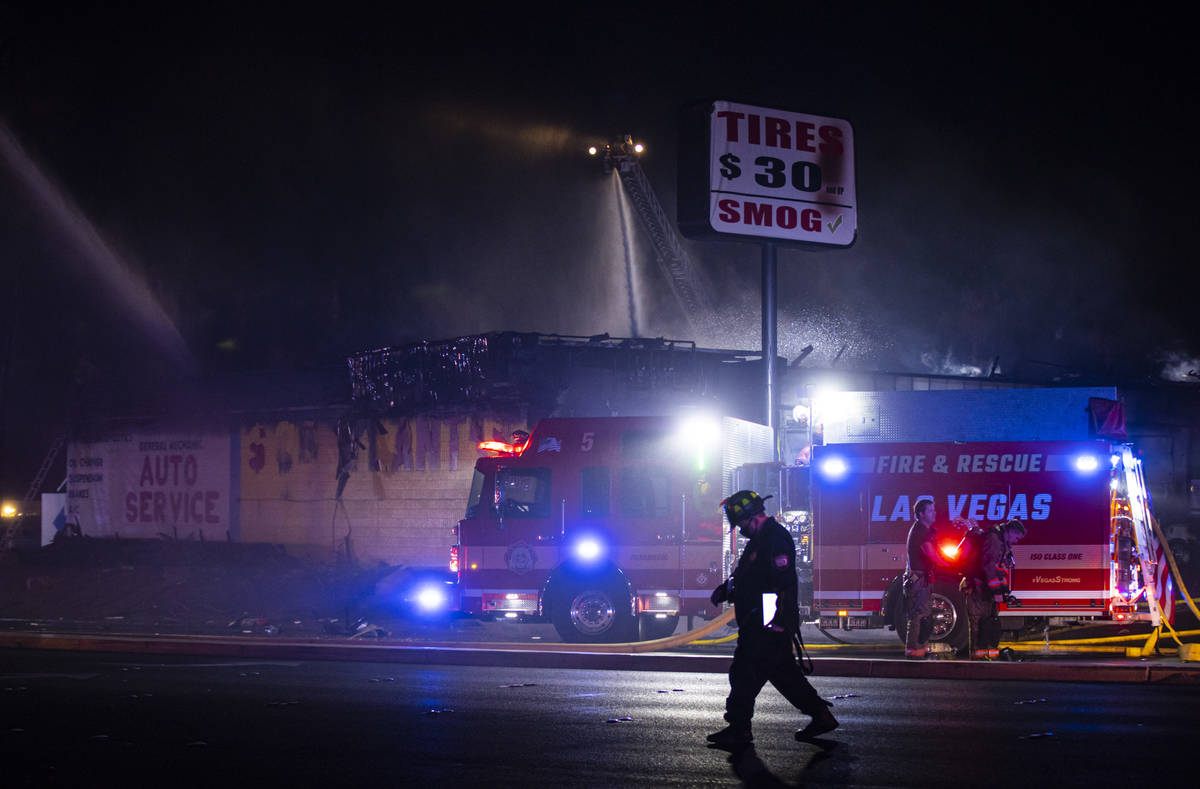 Las Vegas firefighters respond to a fire at a tire shop off Decatur Boulevard at Meadows Lane i ...